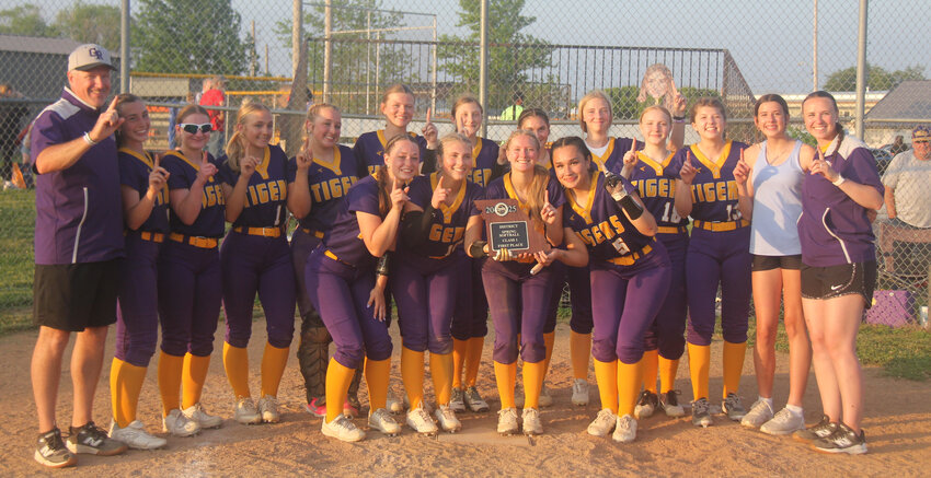 The Green Ridge softball team celebrates winning the Class 1 District 7 championship after beating Northwest 12-4 on Wednesday, May 14, at Northwest High School. The title is the Lady Tigers’ first since 2014.