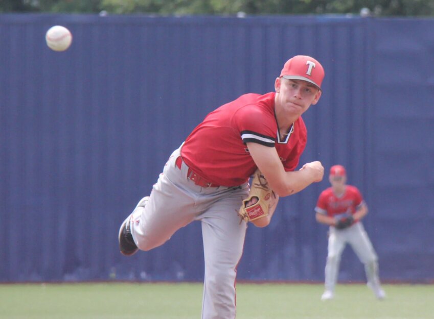 Tipton's Lucas Cashman pitches the ball during a game last season.