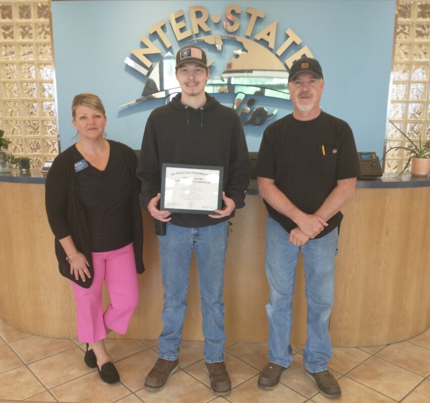 From left: Rochelle Hockett, SFCC director of Career Services; Austin Thompson, maintenance technician at Inter-State Studio; and Don Beyer, maintenance electrician, at Thompson’s apprenticeship certificate presentation.