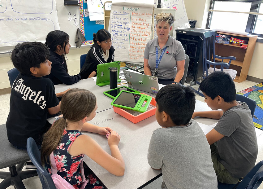 At Skyline Elementary Thursday district EL instructional coach Emily Overstreet teaches students at English Learner Summer Camp.