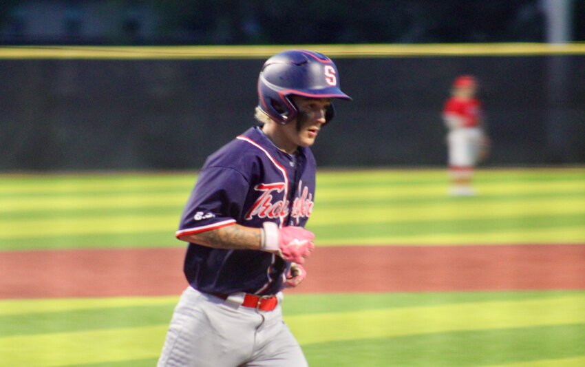 Jayden Archiebque advances down the first base line after reaching on a walk against Warrensburg Mule Club Post 131 on Tuesday, June 17, at the Warrensburg Activities Complex.