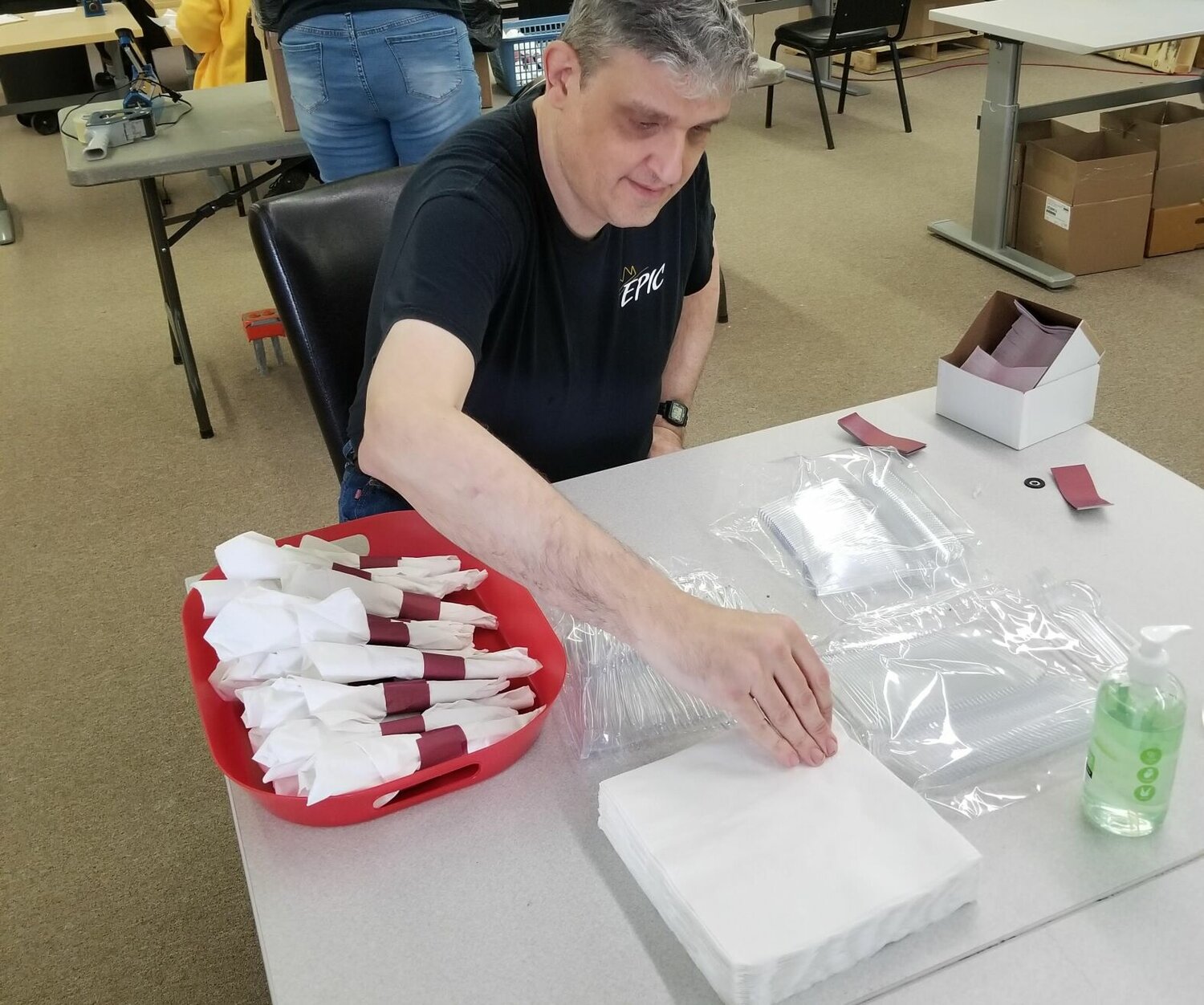 Mark with EPIC WorkForce in Lincoln rolls silverware. 


Photo by Vanessa Schardan | Democrat