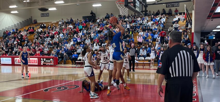 Lily Brown (12) goes up for two of her 18 points in Monday's win vs Columbia.
