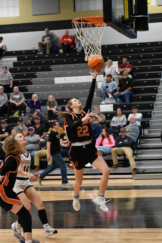 Kaegan Young (22) goes up for two of her 11 points against Loretto.