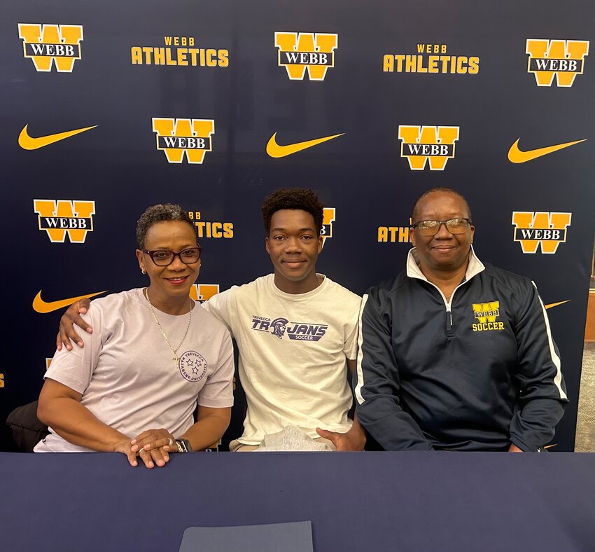 Christopher Douglas with his mother and coach after signing to continue furthering his soccer career for the Trojans of Trevecca University, Nashville, TN.