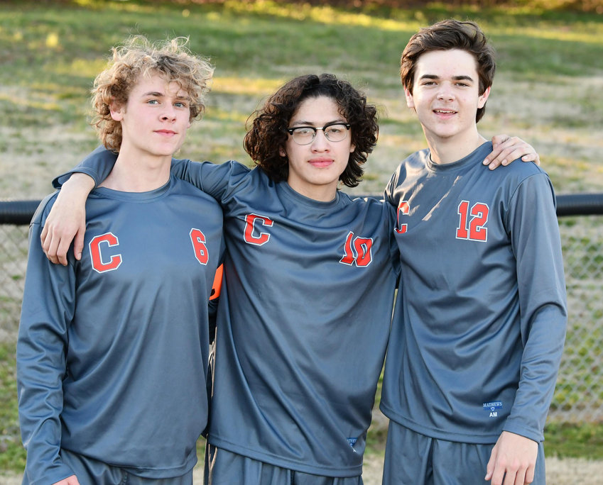 Before Thursday night&rsquo;s match, Cascade honored seniors (from left) Drake Hodge, Pablo Sola and Freedom Williams for their efforts playing with the Champions.