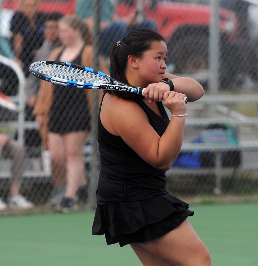 Senior Emma Habel returns a serve in singles action against Franklin County. She took an 8-1 singles victory.