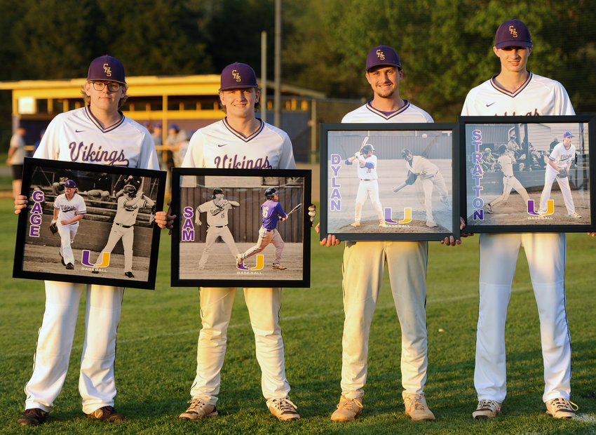 Prior to first pitch of Game 2 against the Monarchs, Communty honored seniors (from left) Gage Underwood, Sam Holley, Dylan Norris and Stratton Lovvorn.