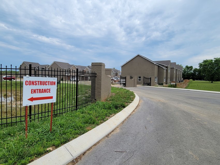 This new townhouse development is located at the intersection of Buddy Overcast Parkway and Horse Mountain  Road, behind H.V. Griffin Park. Called Park Place the  townhomes are being constructed by Black Diamond  Construction, LLC. Benchmark Reality is selling the lots.