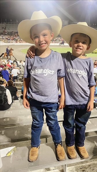 These two little Wranglers, Charleston and Conlee Swing, 6-year-old twin children of DeWayne and Bethany Swing, were all set for the horse show this week. The photo was captured by Bethany. The show continues through Saturday, when the world grand champion will be announced.