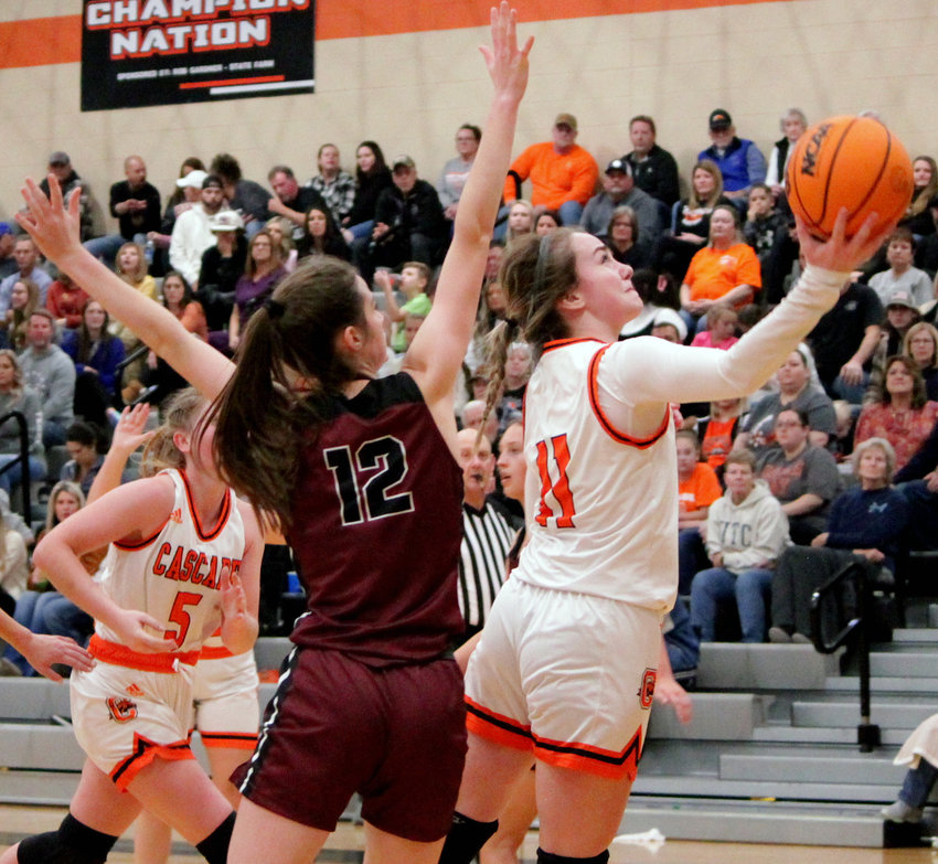 Isabella Rhodes slashes through the paint for a layup in the third quarter against Eagleville.