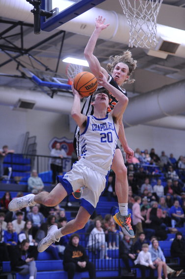 Lucas Clanton flies in and blocks a shot by Forrest&rsquo;s Ryan Meglis.