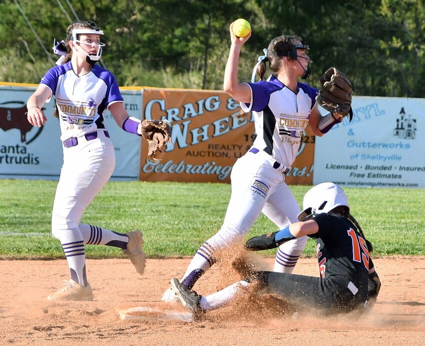 Abi Brown of the Viqueens throws to first to complete the double play after receiving the toss from Audrina Bearden while avoiding the slide of Cascade's Ella Thompson.&nbsp;&nbsp;