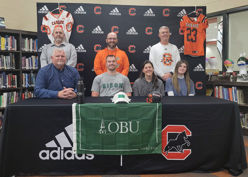Cole West signs his letter of intent to continue his football career with Oklahoma Baptist.