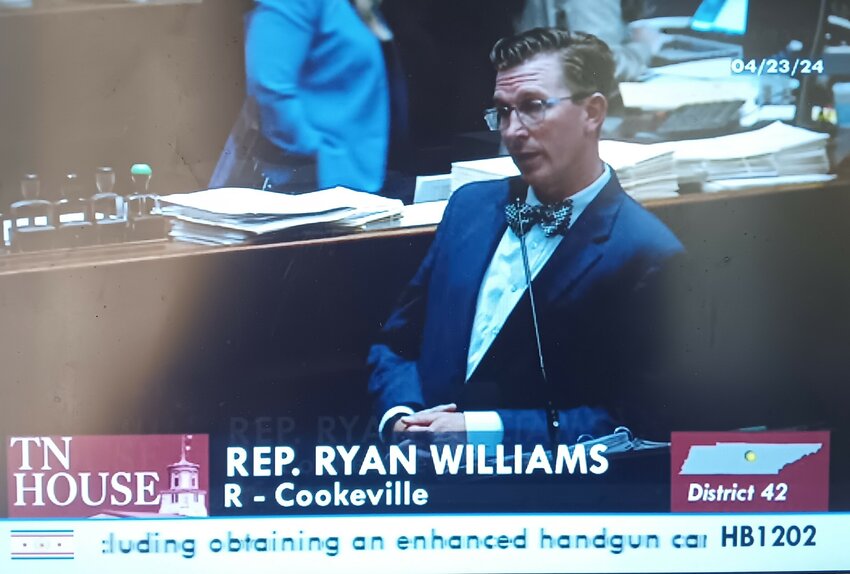 State Rep. Ryan Williams (R-42) of Cookeville addresses fellow Tennessee House members Tuesday afternoon as the Chamber looked to pass a teacher gun-carry in public schools proposal the representative said he had worked on for a few years.