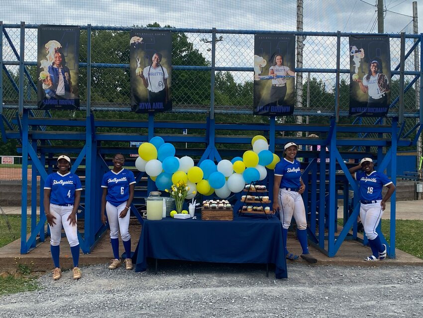 The four Golden Eaglettes Softball Seniors (from left to right), Sammie Brown (4), Kiya Akil (6), Lilly Brown (12) and NeVeah Buchanan (18) were honored before Sunday&rsquo;s game.