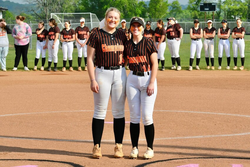 Brianna Horn (11, left) and Claire Perry (14, right) are honored as the only two seniors on Friday night.