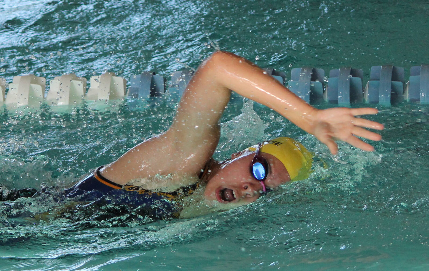 Ally Maybee gets some air during the 50 Meter Freestyle.