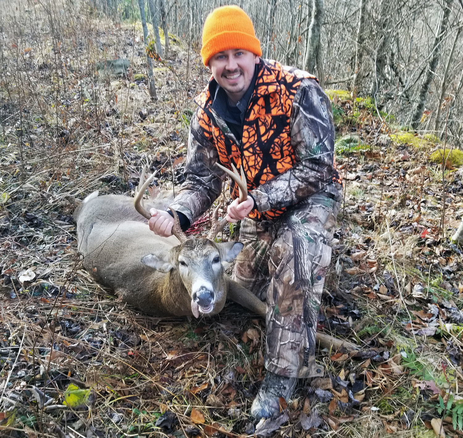 Sports editor Chris Siers took this eight-point buck over Thanksgiving week in West Virginia while hunting with his family.