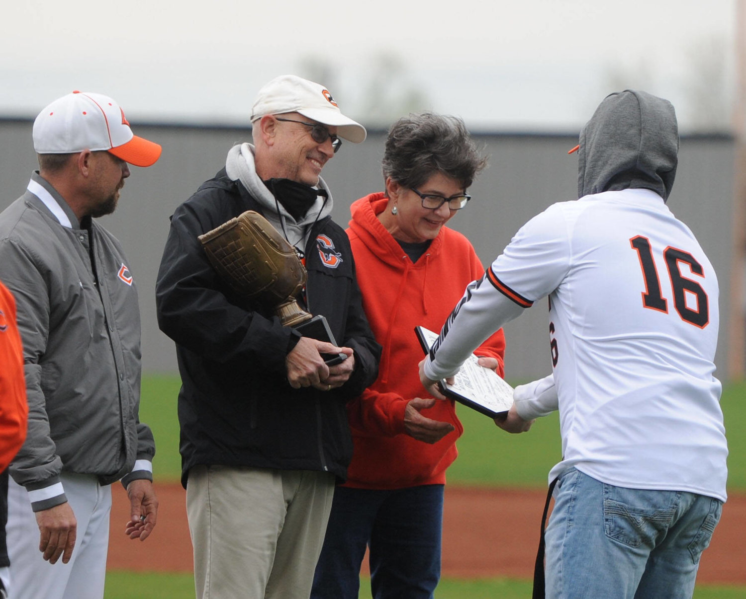 Dale Rucker and wife Linda were presented with a commemorative plaque during his final season as Cascade athletic director.