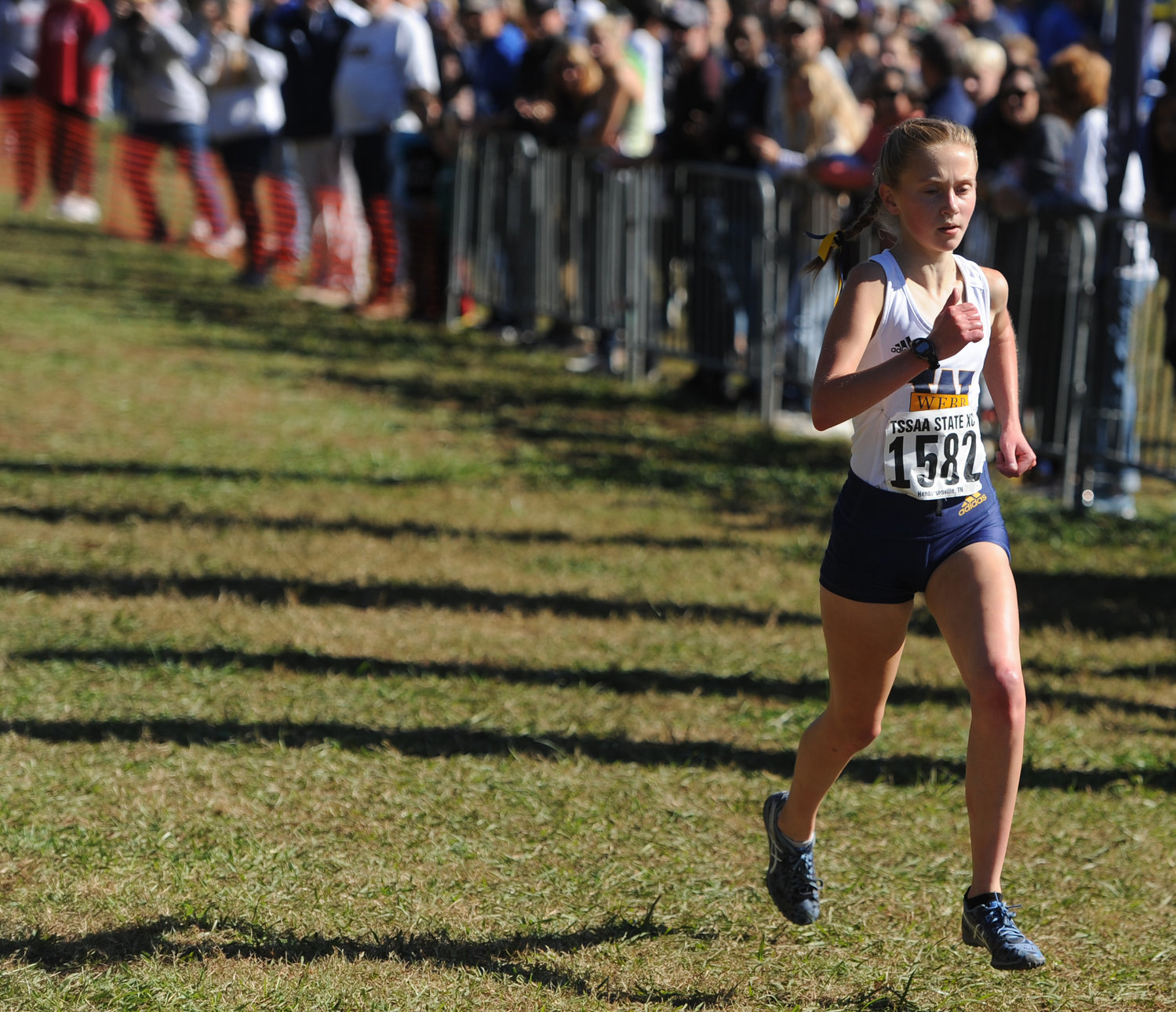 Webb freshman Abby Faith Cheeseman powers her way to the finish line and her first state title in the Division II Class A state championship. She ran a 17:26.91, the fastest time of any classification during the 2021 state meet.