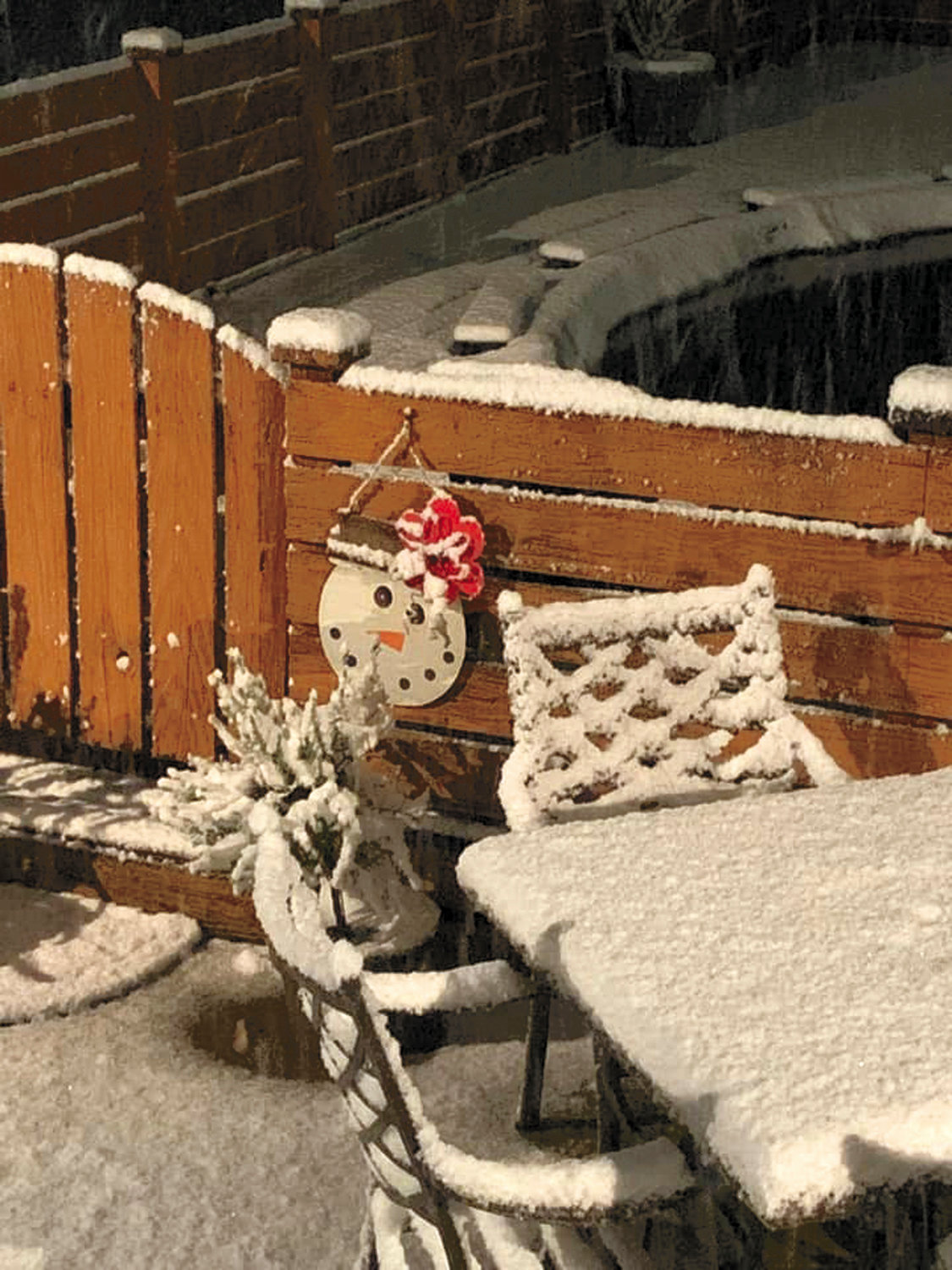 This “snowman” hangs around with actual snow.