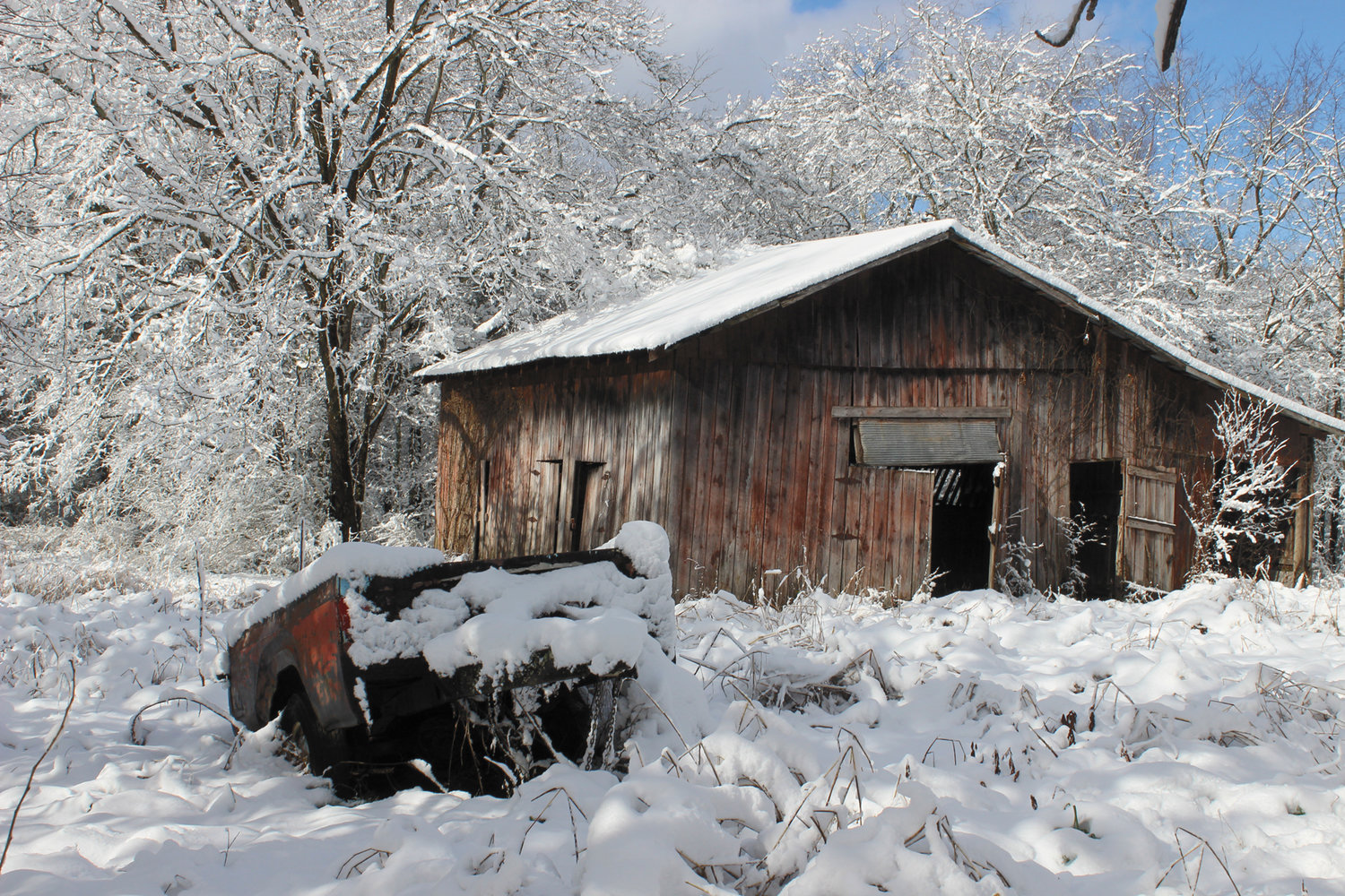 An abandoned barn on Himesville Road rests peacefully in a blanket of snow.