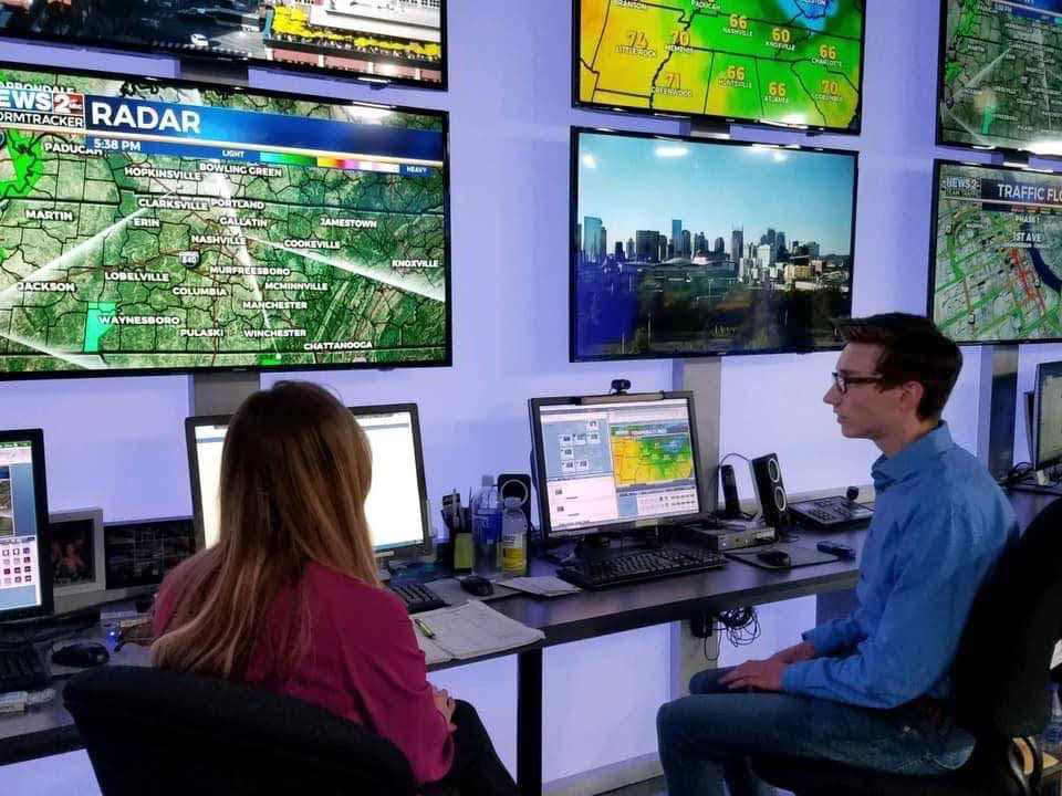 Elijah Kirby, right, takes a look at WKRN-TV’s (Channel 2) weather department. The
man behind the popular and informative Shelbyville Weather page on Facebook says
he’s more focused toward hopes to become a National Weather Service meteorologist rather than television work.