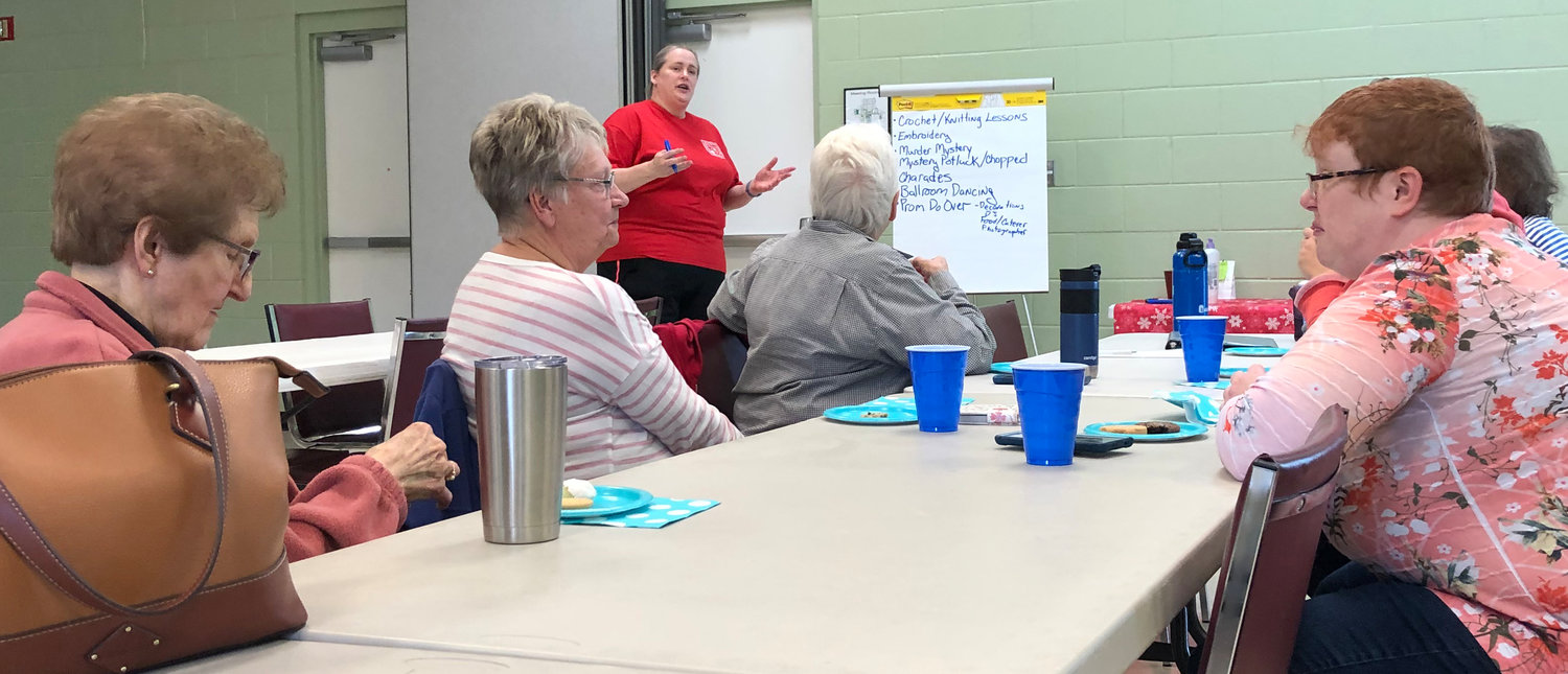 Senior Coordinator Cindy Allen discusses possible future recreation activities at Shelbyville Recreation Center with a group or regular participants Friday.