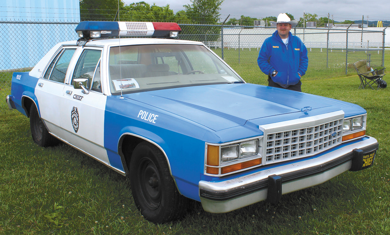 Jason Sons shows off his 1987 Ford Crown Victoria with police package, set up as a replica of a patrol car from the “In The Heat of the Night” movie and television series.