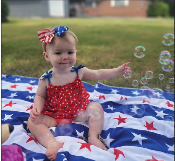 Little 10-month-old Winry Gieske enjoyed her first 4th of
July. Photo by Carlee Gieske.