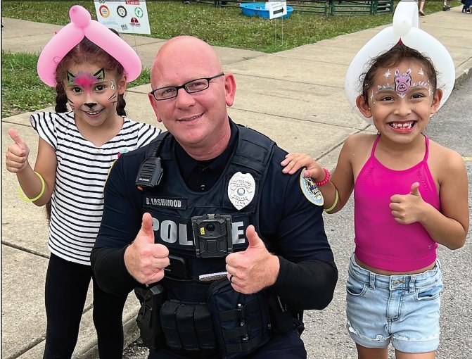 Local law enforcement officers greeted students during the back-to-school event last Saturday.