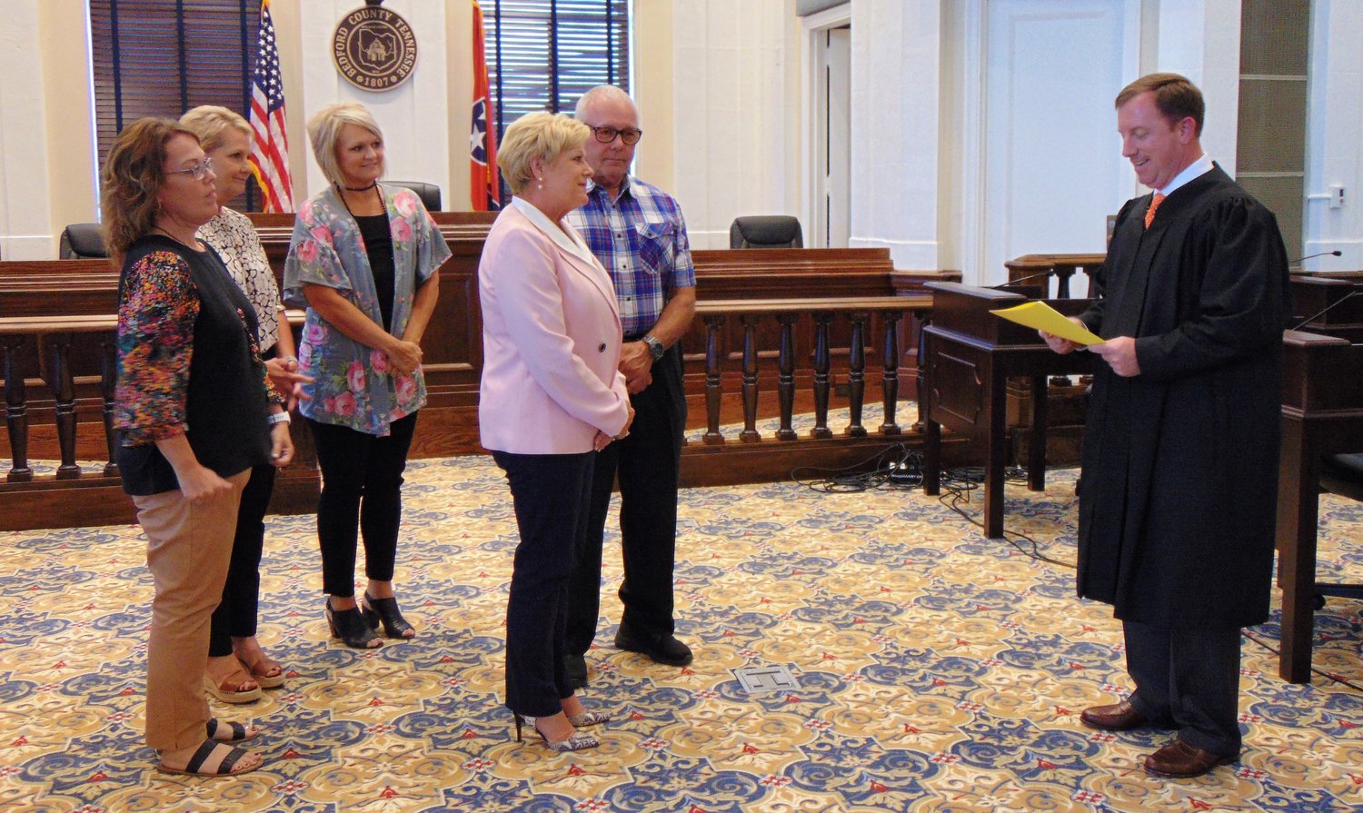 Tonya Davis was sworn in recently along with other county officials by Judge Wyatt Burk.