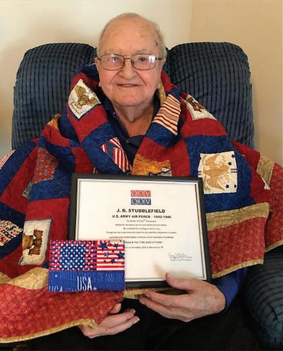 Prior to his passing, J.B. Stubblefield was wrapped
in a Quilt of Valor. He realized how blessed he was to
live so long, given his military missing in action story,
which will be discussed at the upcoming mule show.