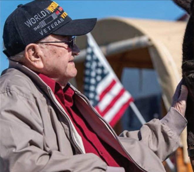 Veteran J.B. Stubblefield, who was nearly 104 years old, loved mules. American
Mule and Bluegrass Festival / Freedom Sings USA will be honoring and celebrating
his life and that of other veterans with a 2-day wagon train. The goal is to have 104
wagons that represent very year of Mr. Stubblefield’s life
