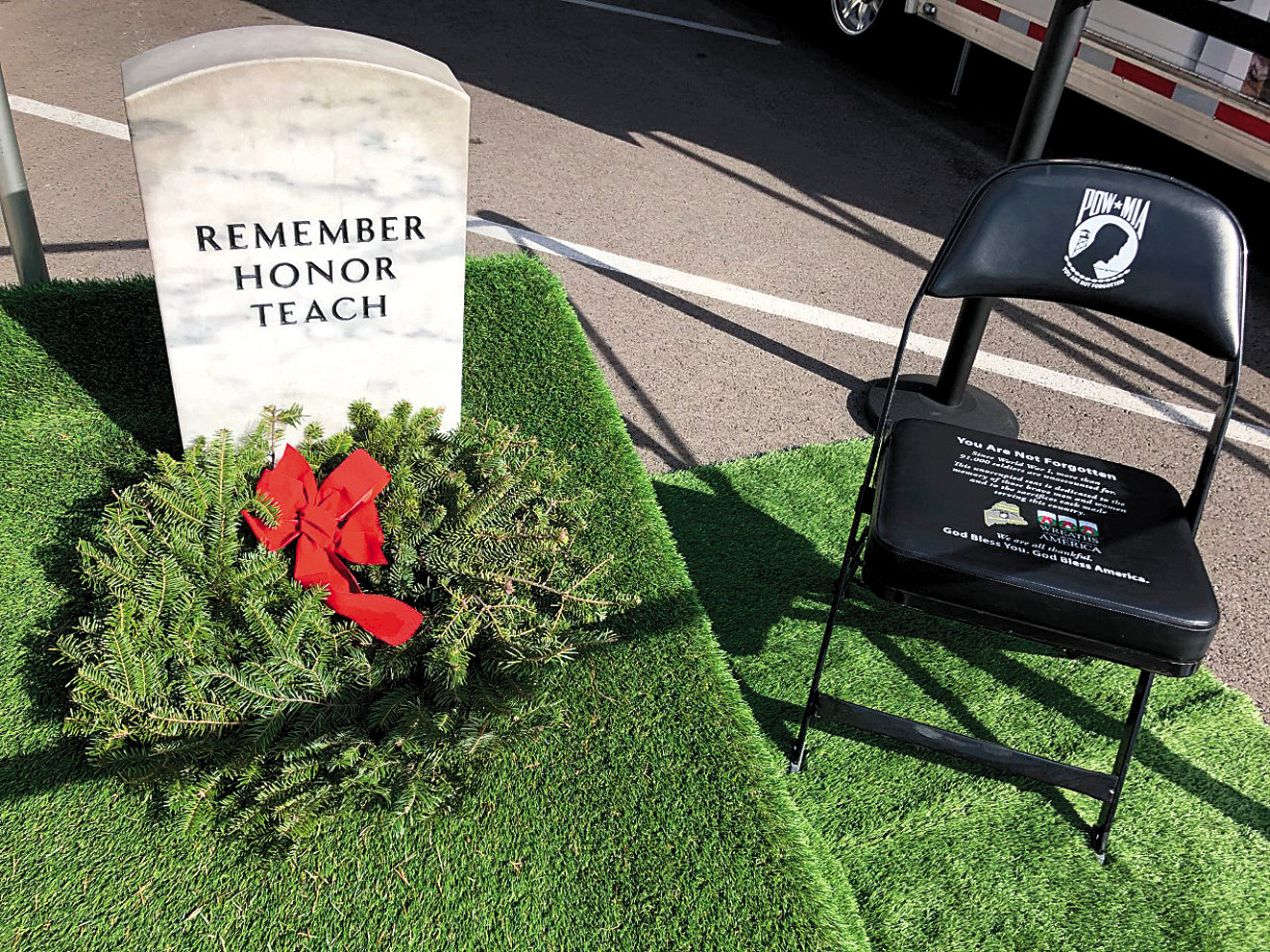 An empty chair commemorates prisoners of war and soldiers missing in action.