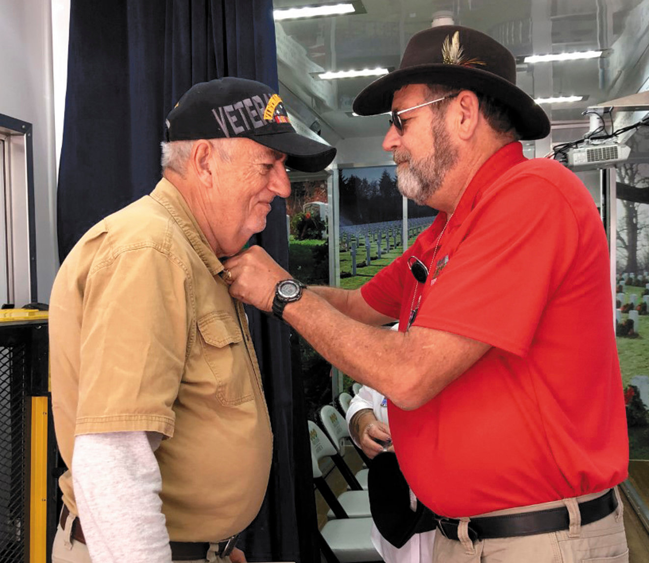 Gary Leverette, a local Vietnam veteran, was surprised with several honors as he visited the exhibit. Andy Tatum of Wreaths Across America presents Leverette a sdpecial pin awarded to visiting veterans and thanks him for his service. “We weren’t always thanked when we returned from Vietnam,” Leverette remarked.