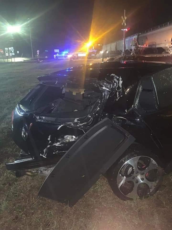 The car struck by a CSX train Monday night in Bell Buckle rests alongside the tracks at the Highway 82 crossing.
