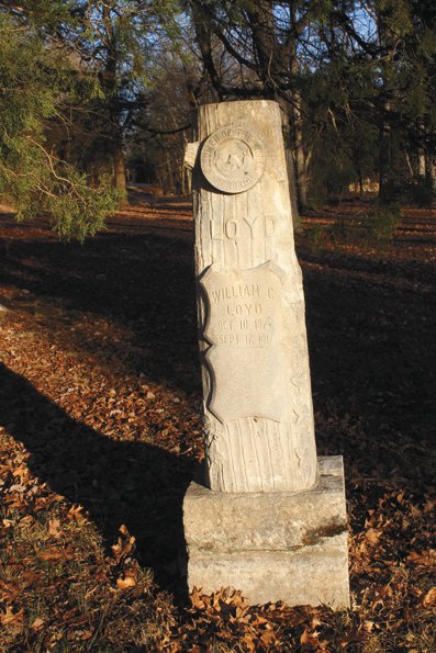 William C. Loyd, a member of the Woodmen
of the World fraternity, is remembered with
this intricately carved monument from 1917.