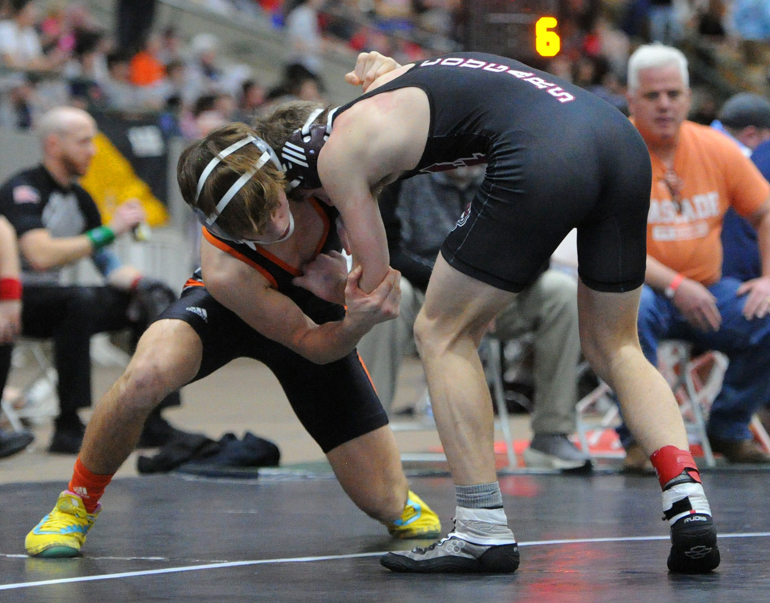 Vayden Moore stabilizes himself in his tournament opener in the 126-pound Class A bracket.