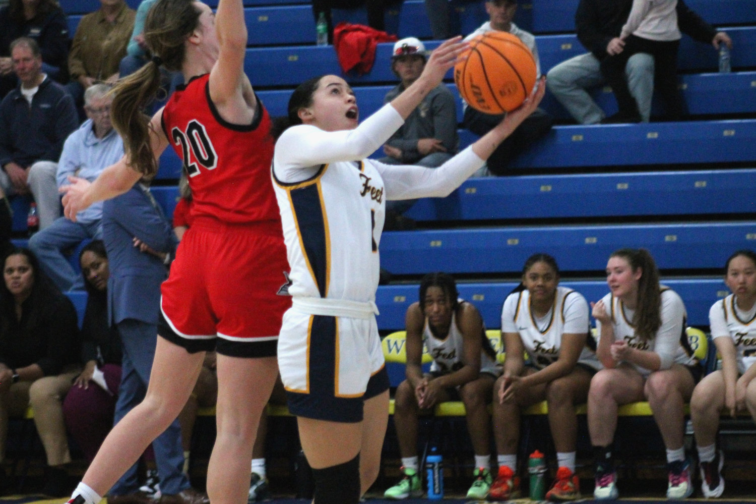 Bree Robinson fights through contact for two points on Friday night against Fayette Academy. 