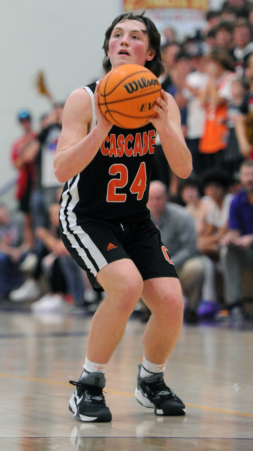 Senior Jackson Davis hits the brakes and pulls up for a jumper. He scored 12 points in his last game with Cascade.