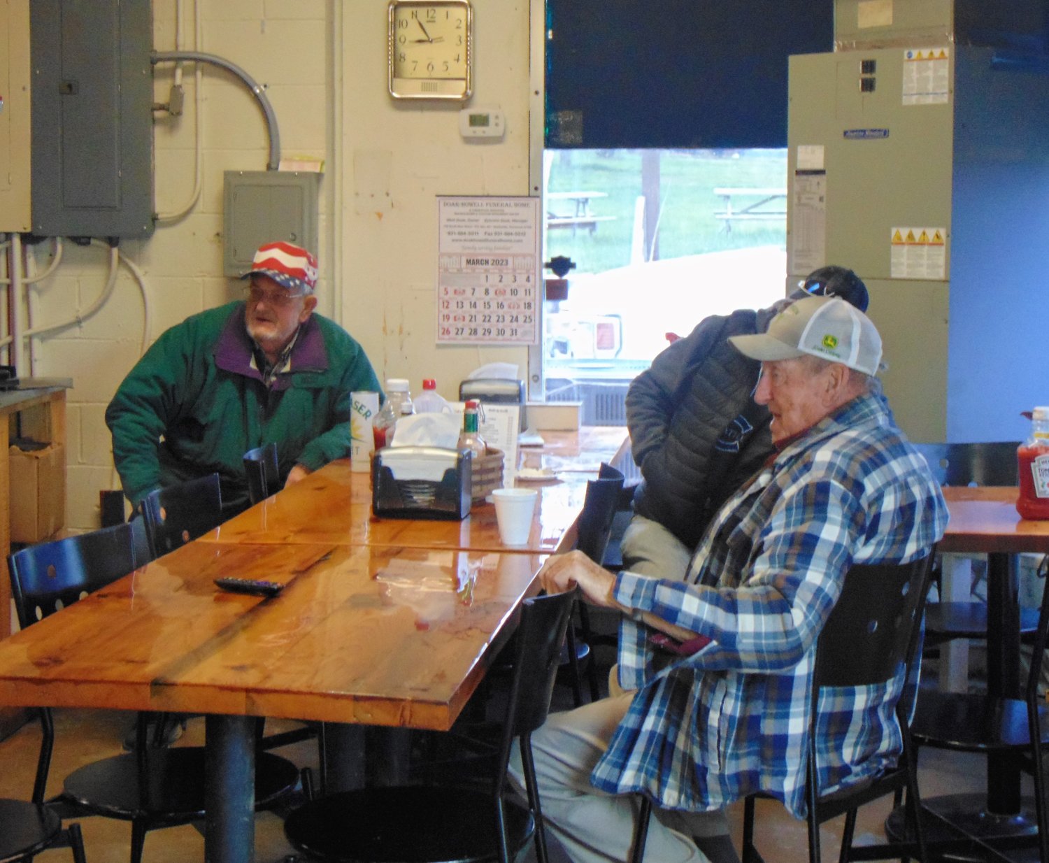 Some regulars enjoying their coffee on a chilly Monday morning.