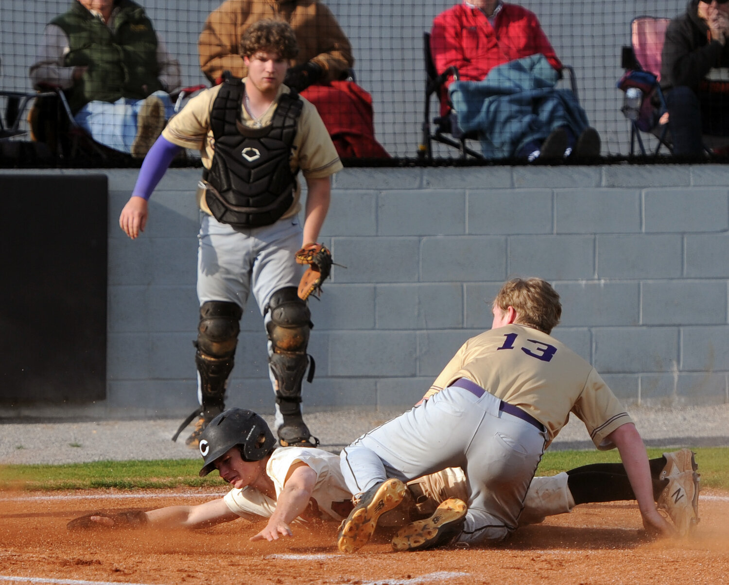 Blaine Paschal covers home after a passed ball and swipes a Cornersville base runner for an out.
