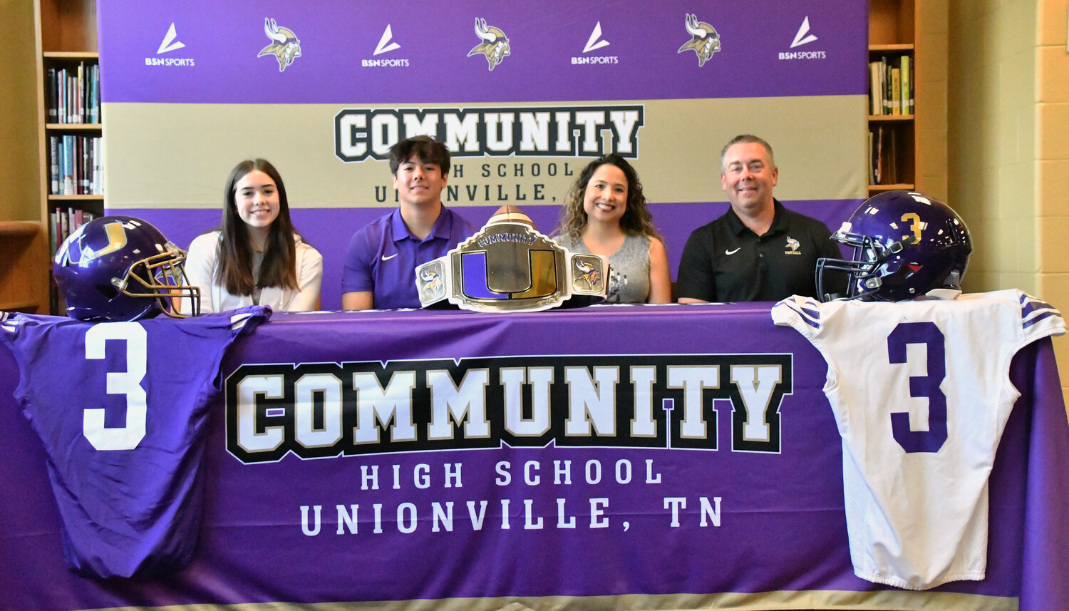 Dallas Grooms signs his letter of intent to continue his football career at Sewanee.