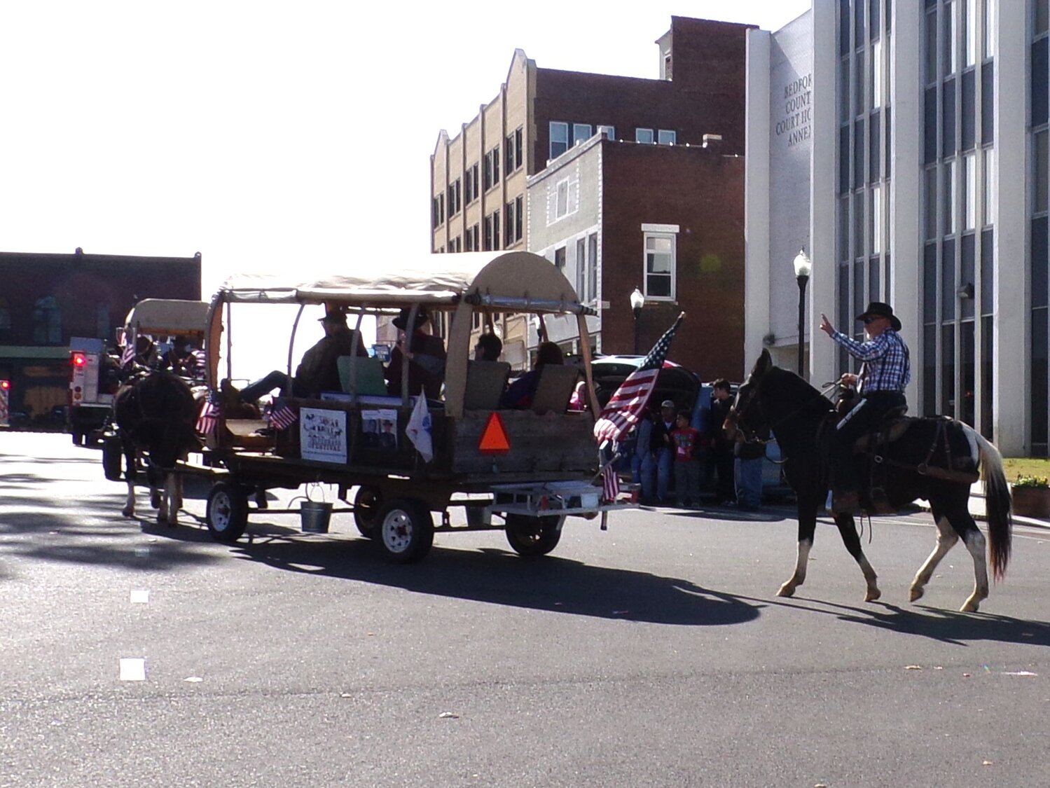 Wagons and horse and riders proudly displayed the American Flag at Saturday's Veterans Day Parade.