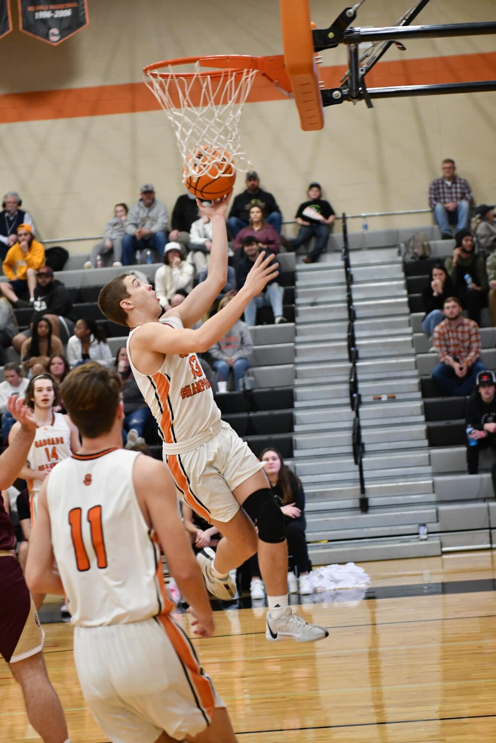 Cascade's Tucker McGee (13) floats through the lane for two of his seven first quarter points against Cannon County on Tuesday.
