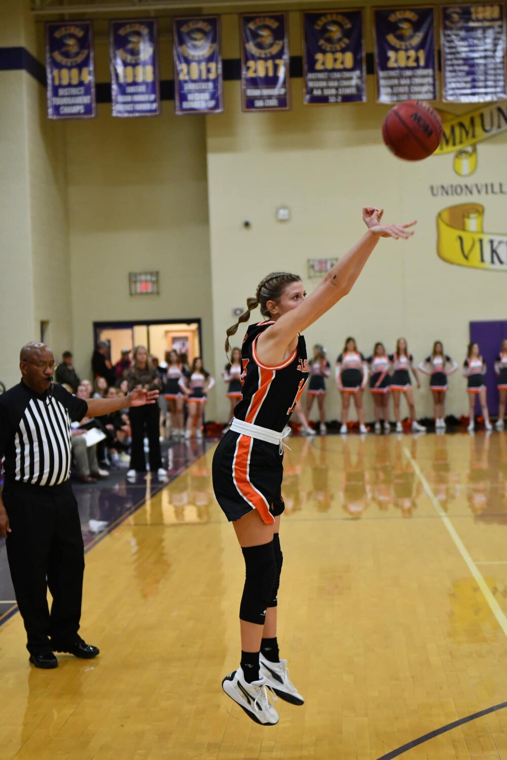 Kaydence Miller (14) lets loose from downtown at Community. She finished with 12 points on four made three-pointers in Friday night's loss to the Viqueens.