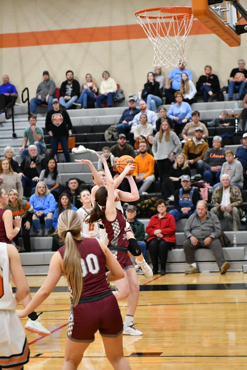 "Super Sophie" Ray (5, with the ball) puts up a buzzer-beating left-handed floater to send the game into overtime. She was second on the team with 15 points in the win over Eagleville on Tuesday night.