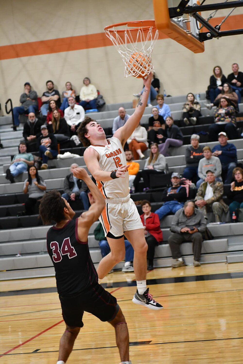 Saebyn Burris (12) soars to the basket for two of his nine points against Eagleville on Tuesday night.